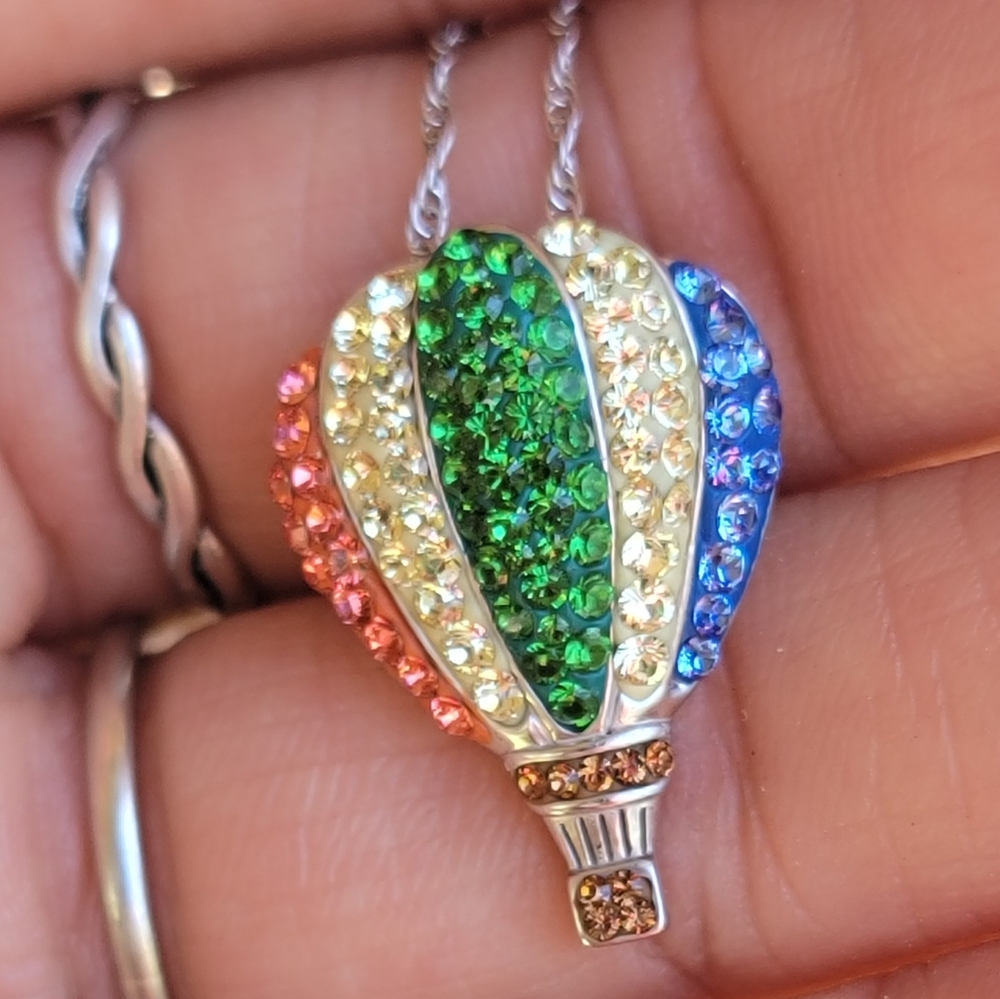 NWT Artistique Swarovski crystals orange, yellow, green, and blue 925 sterling